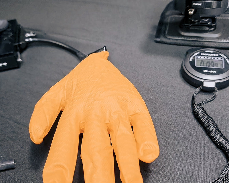 Bench test setup - ExFog unit with sealed glove and stopwatch at zero