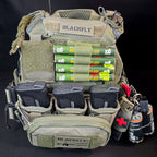 Green BFly 4-round holder with four MK5 thunderflash grenades mounted on a plate carrier velcro panel (grenades not included)