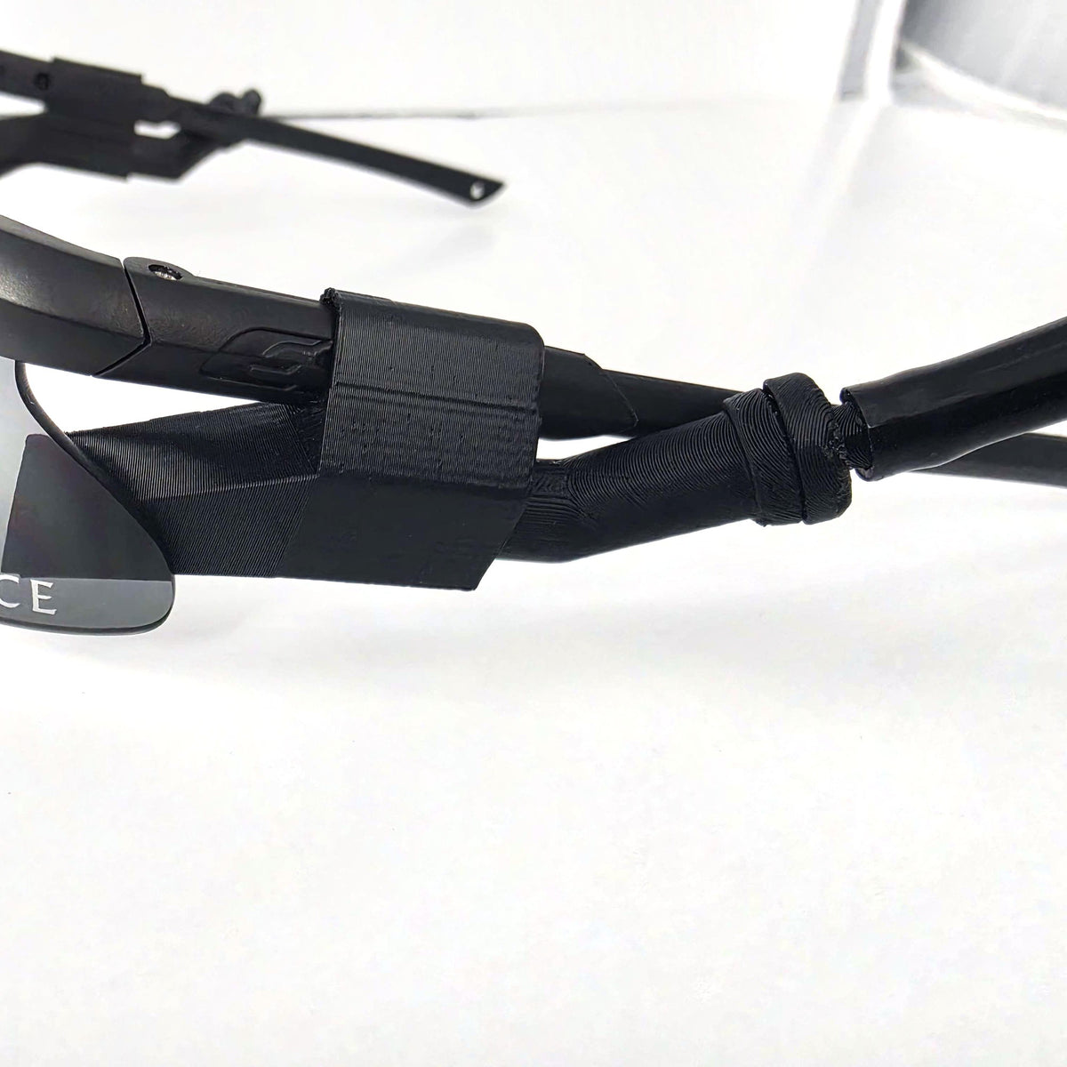 Close-up of magnetic 45 degree insert connected to ExFog tubing on a Clearflow Adapter