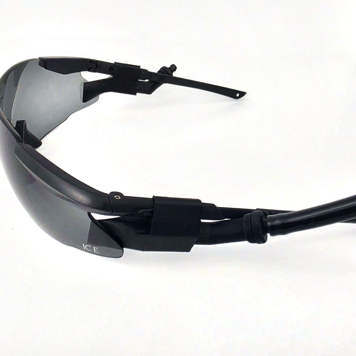 Magnetic 45 degree insert routing ExFog tubing along the temple of tactical glasses