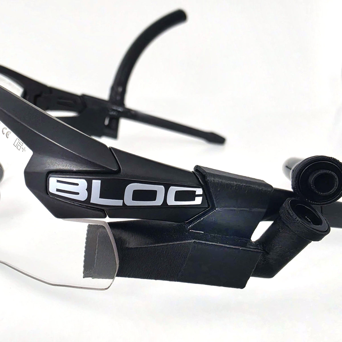 Magnetic 90 degree insert disconnected from ExFog tubing for quick eyewear removal